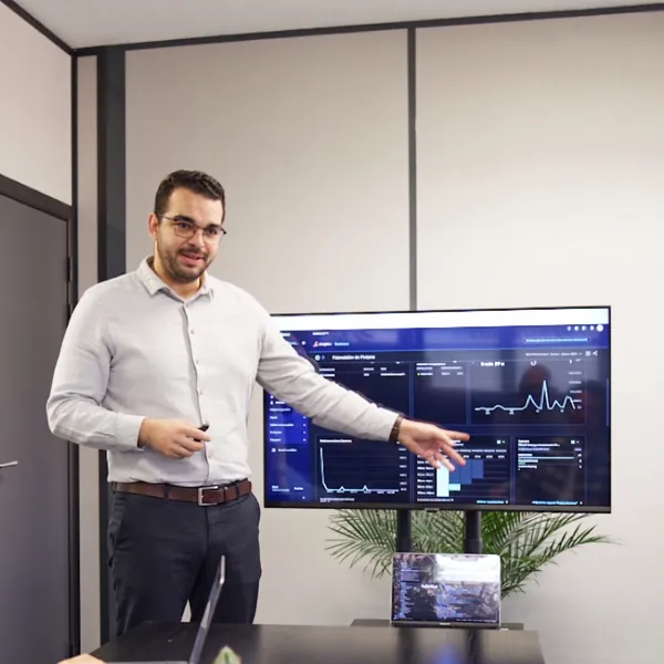 Developer teams working in the offices of the Dexon agency specialising in mobile and web application development